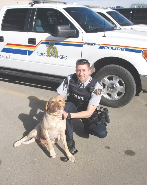 Constable Kyle Edwards helped get stolen pooch Lucy back to her rightful owners.