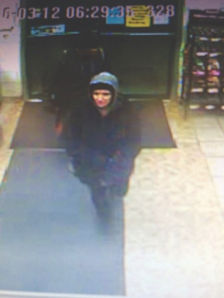 A woman wanted in connection with the theft of a vehicle from the Shell gas station in Crossfield was caught on video surveillance.