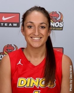 Kristie Sheils (left) a point guard with the University of Calgary Dinos women&#8217;s basketball team, has been charged with child sexual exploitation after an investigation 