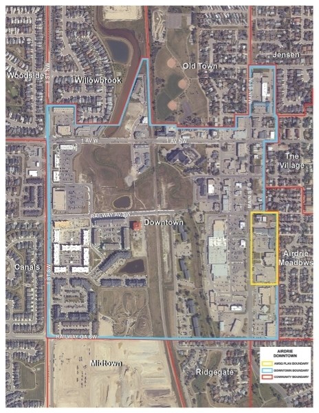 A blue line indicates the current area defined as downtown by the City of Airdrie, which encompassed the controversial Airdrie Main Street Square area, outlined in yellow.