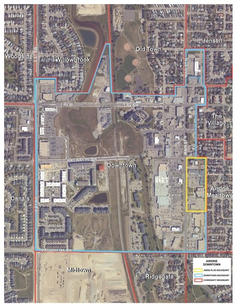 A blue line indicates the current area defined as downtown by the City of Airdrie, which encompasses the controversial Airdrie Main Street Square area outlined in yellow.
