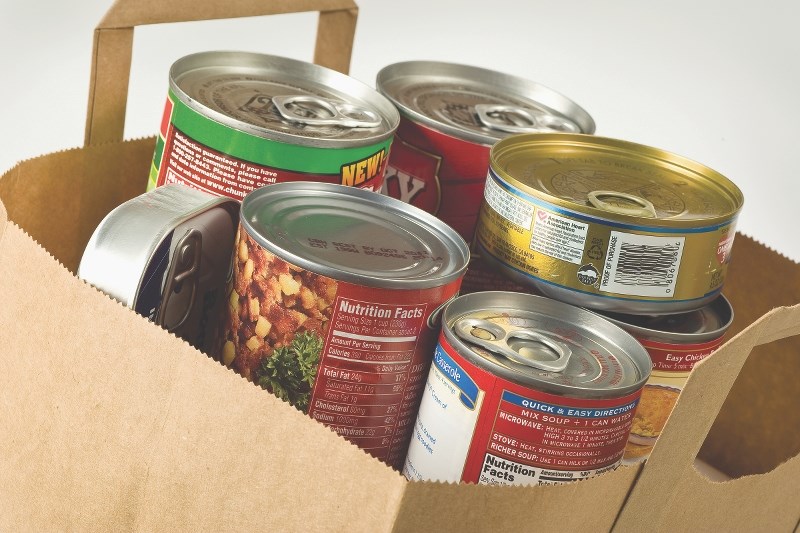 Volunteers with Helping Hands will be visiting households in Cochrane, Bragg Creek and Redwood Meadows April 21 to pick up donations for the Cochrane Food Bank. Residents can 