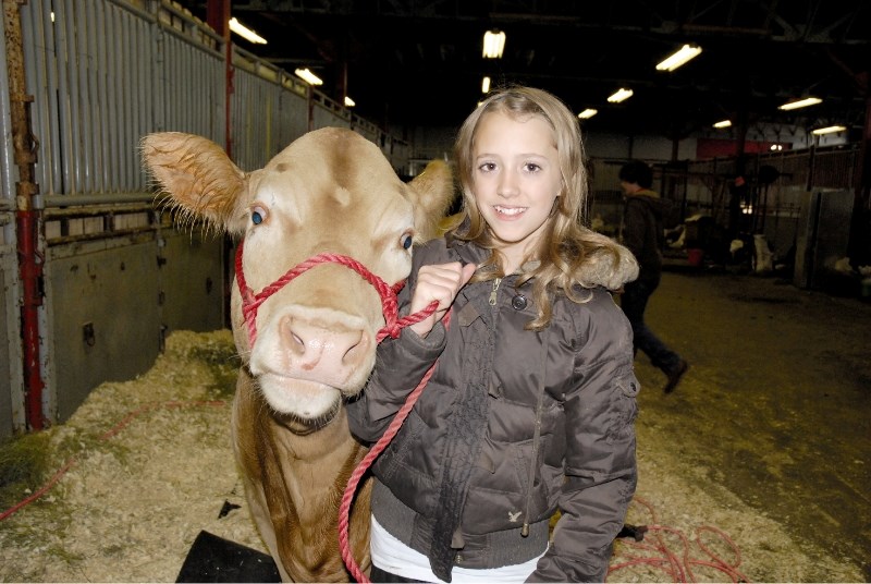 Rachel Drake of the Irricana Beef &amp;amp; Multi Club won Grand Champion Overall Steer at the 4-H on Parade show at the Calgary Stampede grounds, May 28-30.