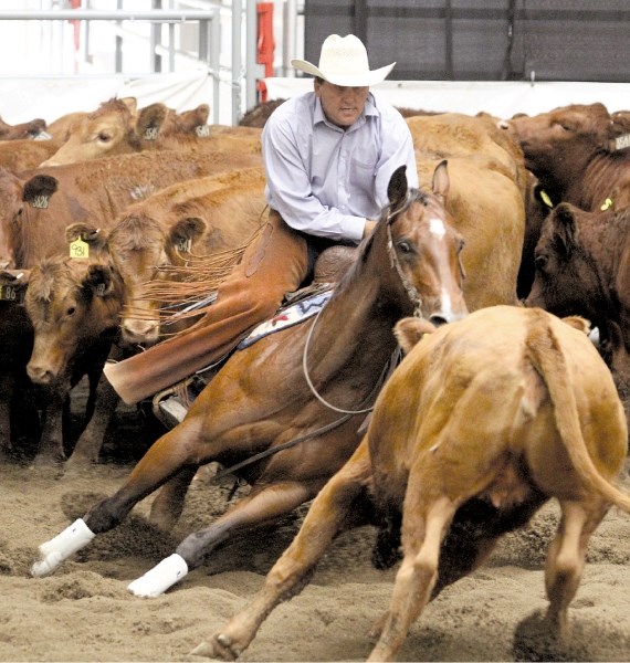 Irricana&#8217;s Doug Reinhardt competes in the open cutting finals at the Calgary Stampede, July 15. .