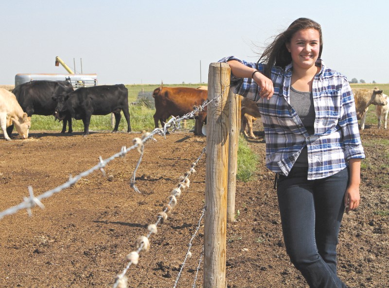 Seventeen-year-old Jordyn Jamieson poses for photos on her family&#8217;s farm near Dalemead, Aug 26. Jamieson is a key member of the Rocky View 4-H District.
