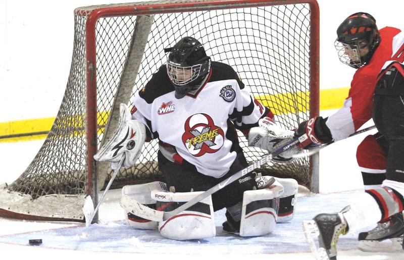 Xtreme goalie Malcolm Walilko makes a big save during his team&#8217;s 4-3 come from behind win over the Camrose Kodiaks, Oct. 3.