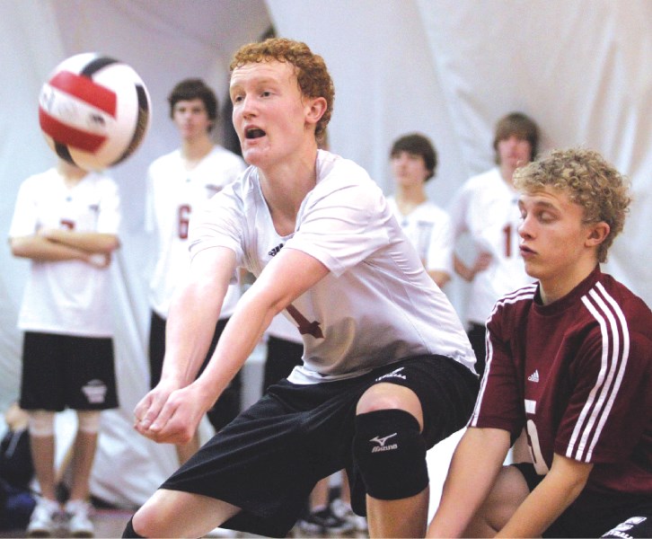 The Cochrane High School senior Cobras defeated the George McDougall Mustangs for the divisional championship, Nov. 6 at the Volleydome in Calgary. The team includes: Terin