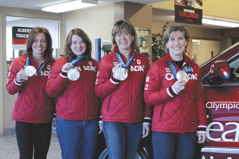 Team Bernard Skip Cheryl Bernard, third Susan O&#8217;Connor, second Carolyn Darbyshire and lead Cori Morris show off their silver medals from the 2010 Vancouver Olympics