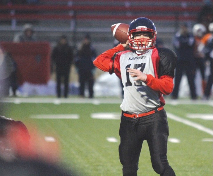 Raiders&#8217; quarterback Vic Primeau drops back for a pass during the team&#8217;s 24-0 loss to the Wildcats at Shouldice Park, April 15.