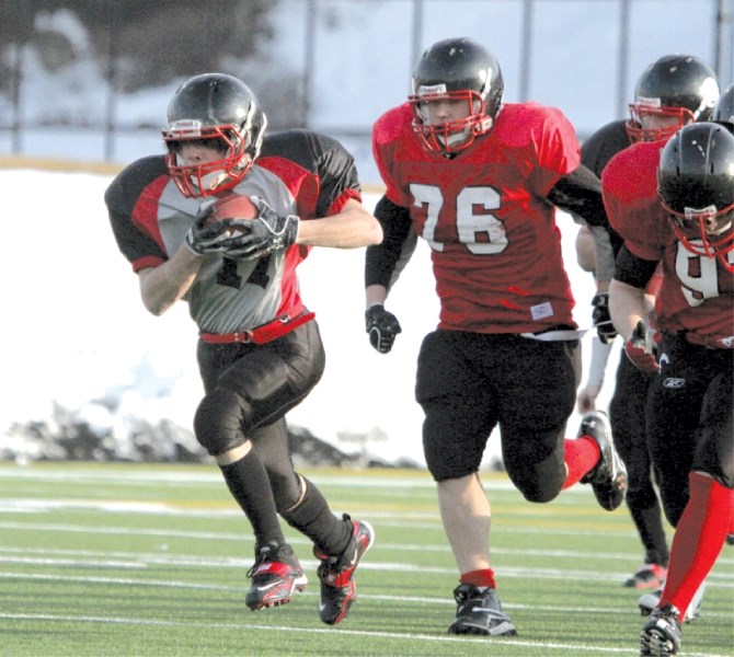 Northern Raiders running back Josh Duazo heads up field to score the only Raider touchdown against the Calgary Stampeders April 20 at Shouldice Athletic Park.