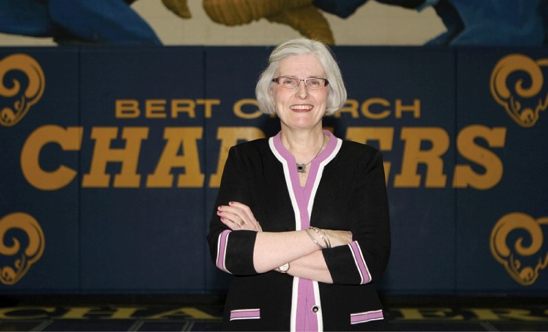 Nancy Adams will step down as principal at Bert Church High School in Airdrie, June 30.