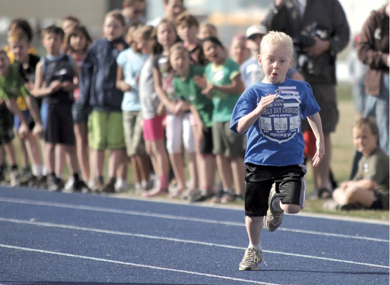 One of Airdrie&#8217;s future track stars runs the track during the Hershey&#8217;s track meet at Genesis Place, May 12. .