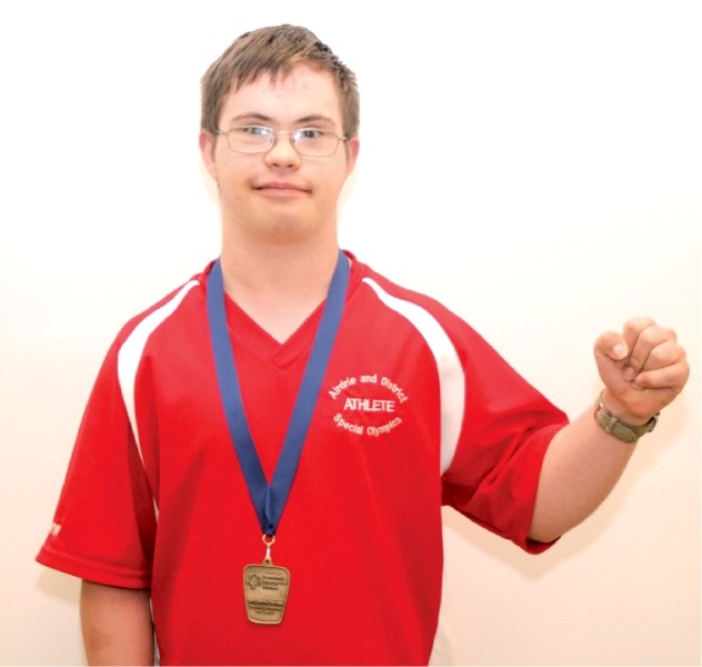 Airdrie Special Olympian Justin Nott was recently named as its athlete of the month for July.
