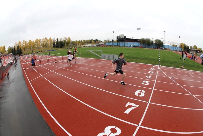 Hurdlers compete in the Grade 7 Boys 80m vent at the 2011 Rocky View Sports Association Middle School track meet, held Oct. 4 at Foothills Athletic Park in Calgary: