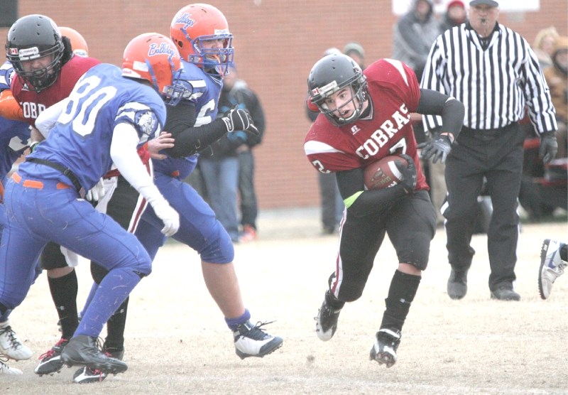Cochrane running back Christian Root weaves his way upfield against the Winston Churchill Bulldogs, Nov. 12. The Cobras went on to defeat the Crescent Heights Vikings, Nov.
