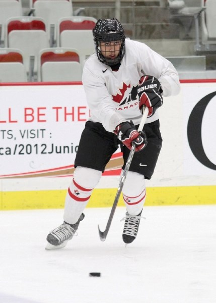 Former Edge School athlete Mathew Dumba warms up before Team Canada&#8217;s Red and White intra-squad game at WinSport Arena in Calgary, Dec. 11.