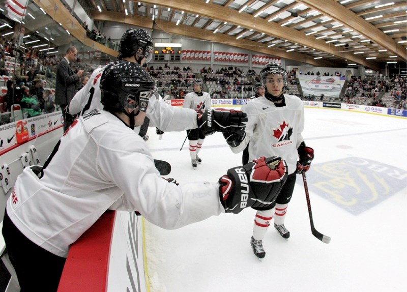 Airdrie&#8217;s Ty Rattie celebrates one of his assists during Team Canada&#8217;s 7-4 win over the CIS All-Stars at WinSport Arena in Calgary, Dec. 13. Rattie was one of the 
