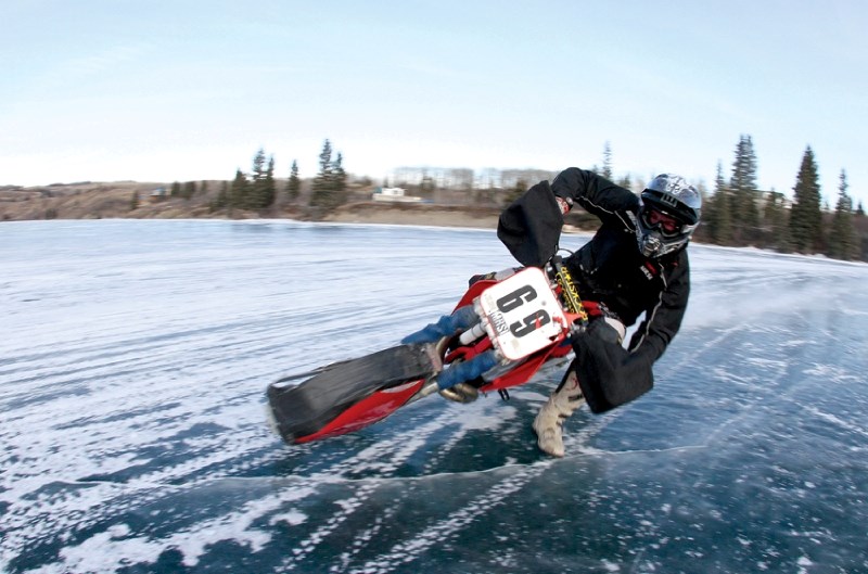 Mitch Brown, along with other members of the Second Gear Club, spent New Year&#8217;s Day feeling out their bikes at Ghost Lake near Cochrane. The Club&#8217;s ice racing