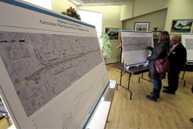 An ISL Engineering representative chats with a member of the public, Jan. 31 at the Springbank Heritage Club. The group was presenting options for future upgrades to Hwy. 22