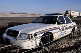 RCMP arrested two suspects after a vehicle rammed a police car on Highway 2 near Carstairs, April 8.