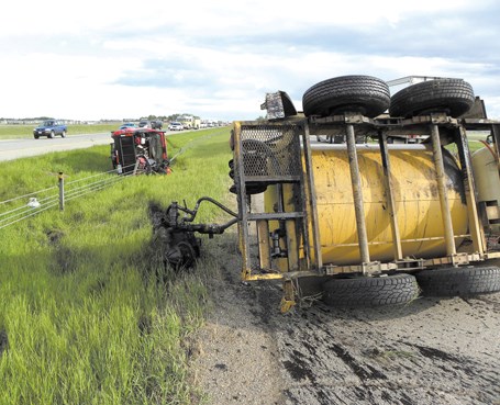 A mechanical failure is believed to be the cause of a single-vehicle rollover on Highway 2 on June 7. Neither of the men in the truck were injured in the accident.