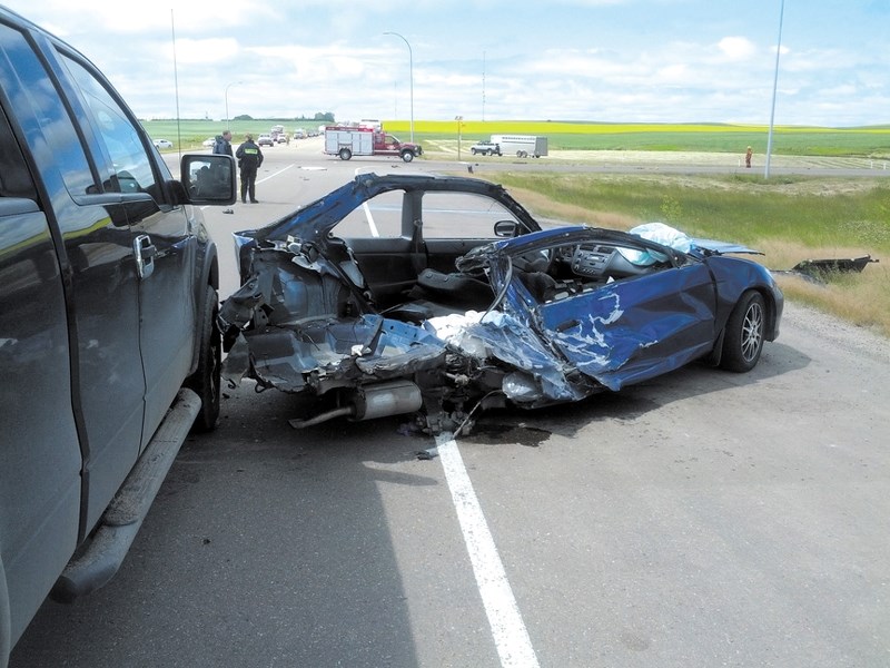 A collision at the intersection of Highways 21 and 9 resulted in the death of a man and a woman being transported to hospital by STARS Air Ambulance in critical condition on