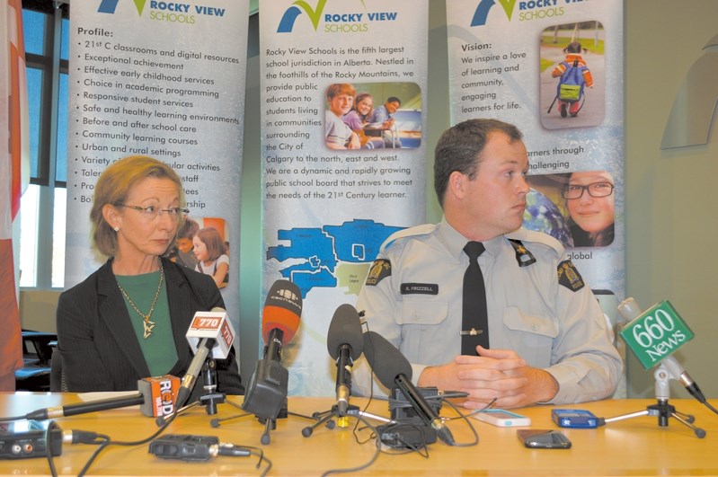 Rocky View Schools Acting Superintendent Susan Williams (left) and RCMP Const. Robert Frizzell speak to the press following a bus collision that occured northeast of