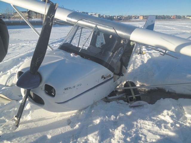 A ski on an ultra-light plane fell through the ice on Chestermere Lake as the pilot was taxiing to shore on Dec. 3. No one was injured in the incident.