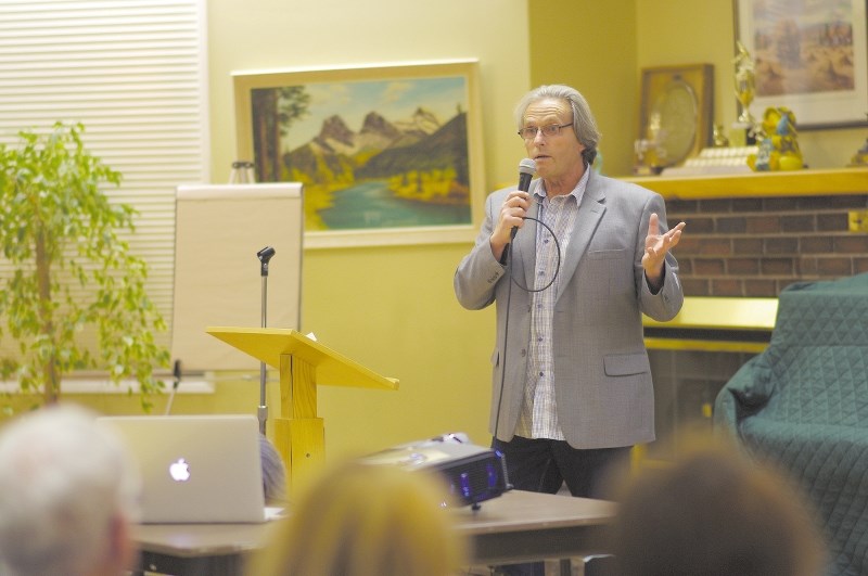 Rocky View County Councillor Jerry Arshinoff spoke to Springbank residents at a Town Hall Meeting on Oct. 21, 2014. Arshinoff is hoping to see an investigation in to the