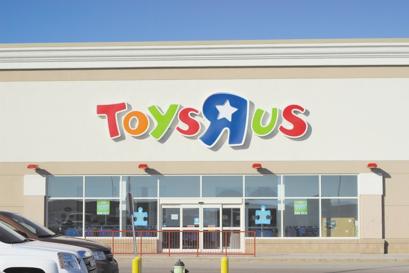 Two people, one a cashier, have been arrested for stealing more than $8,000 in merchandise from Toys &#8220;R&#8221; Us at CrossIron Mills Mall near Balzac in December 2014.