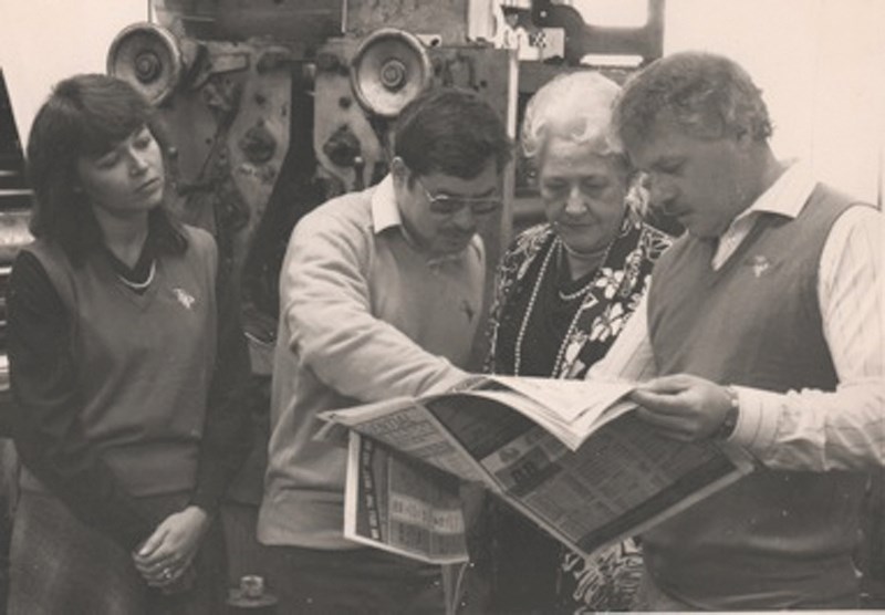 (Left to right) Susan Taylor, Lorne Taylor Junior, Gladys Taylor and Dennis Taylor checked out a copy of the The Wheel and Deal fresh off the press. Taylor, who passed away