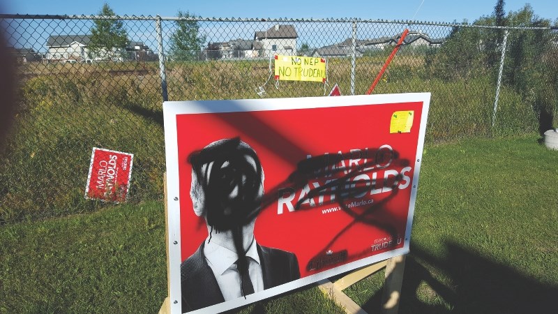 Liberal Party candidate Marlo Raynolds said more than 100 of his signs in Airdrie and Crossfield have been vandalized in recent weeks.