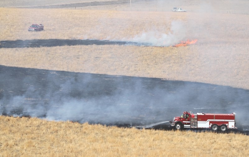 Crews from Cochrane Fire assisted Rocky View County Fire Services to battle a grass fire north of Cochrane March 8.