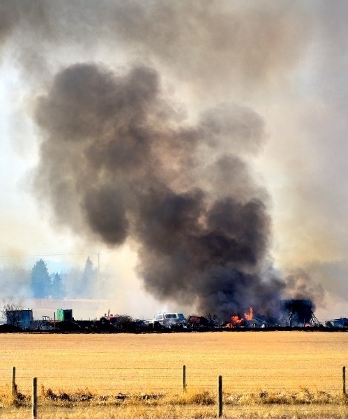 Firefighters fought a fire in a barn and surround field March 22 at a rural property north west of Cochrane.