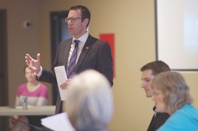 Foothills MP John Barlow asked Rocky View County residents for feedback on physician-assisted dying legislation at an open house in Redwood Meadows on March 29.