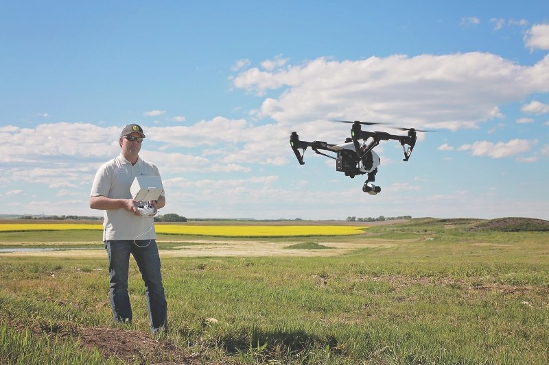 Agriculture Services Officer Ashley Stewart and Rocky View County&#8217;s new aerial drone are working together to help prevent infestations of noxious weeds on County land.