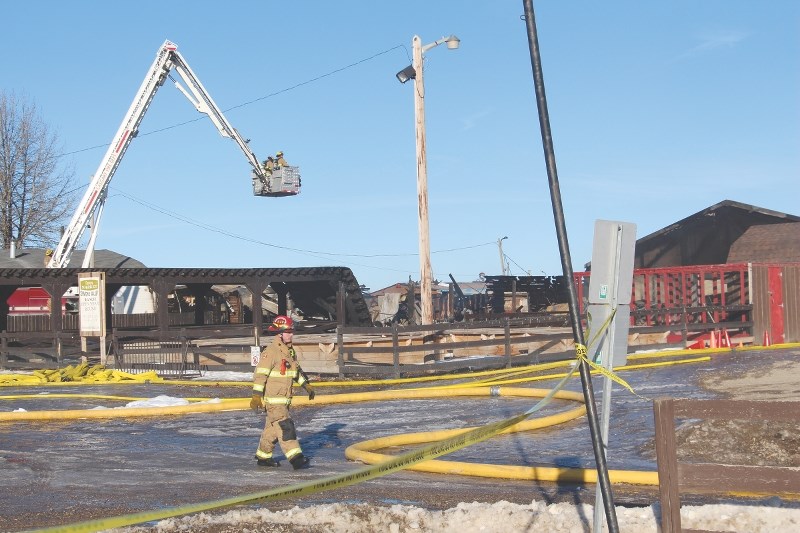 Firefighters were on scene all day Jan. 26 fighting a fire that destroyed the Symons Valley Ranch in northwest Calgary. The cause of the fire is still under investigation.