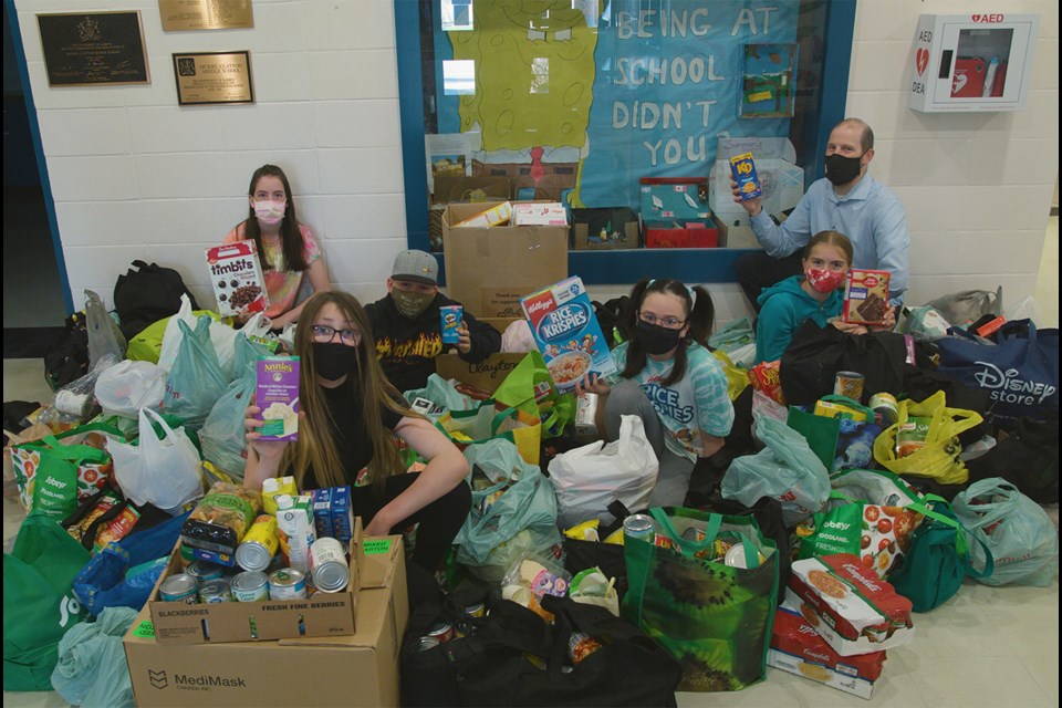 As part of the Get Into G.E.A.R.! initiative, students at Muriel Clayton Middle School rallied together to generate donations for the Airdrie Food Bank during the month of April. Photo submitted/For Airdrie City View