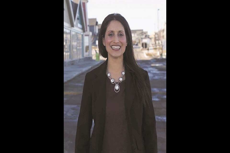 Chestermere-Strathmore MLA Leela Aheer is out of Premier Kenney's cabinet following a recent shuffle that split her previous role among three colleagues. 