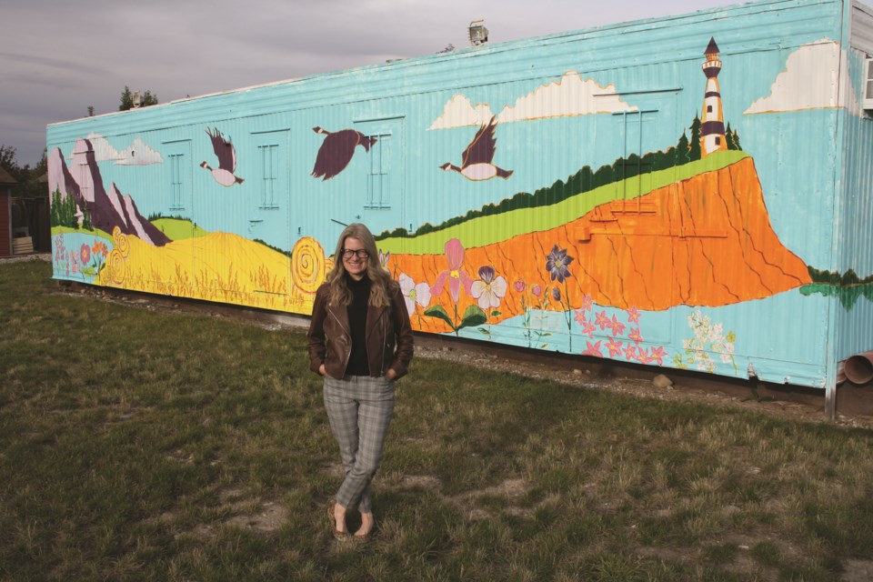Veronica Funk, a local artist, helped transform a construction trailer into a coast-to-coast mural in honour of Airdrie's seniors.