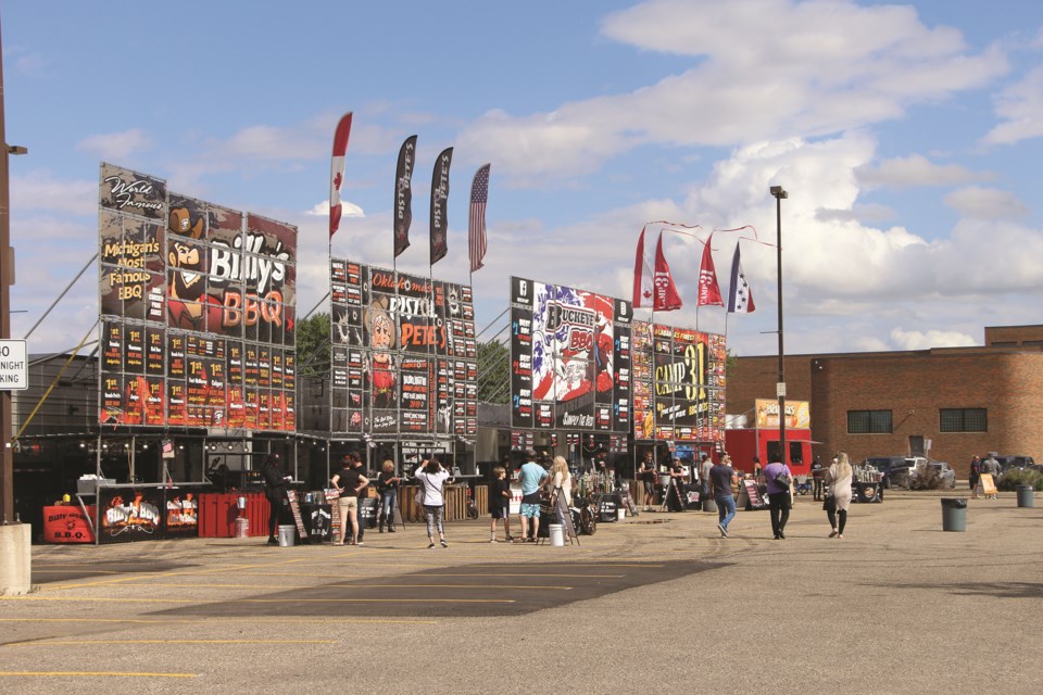 Western Canada Ribfest Tour set up stands in the Genesis Place parking lot on Aug. 20 with patrons eager to taste a variety of ribs on offer. 