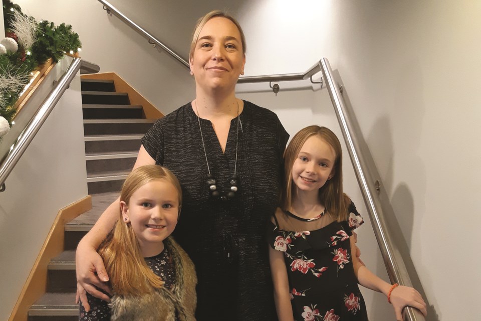 Nicole Haacke is pictured with two of her daughters who she hopes to inspire with her involvement in the Rope for Hope fundraiser event this fall.
