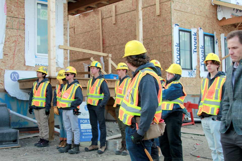 Students of the Building Futures program at their grand opening ceremony at the Brookfield Community of Chinook Gate on Oct. 5.