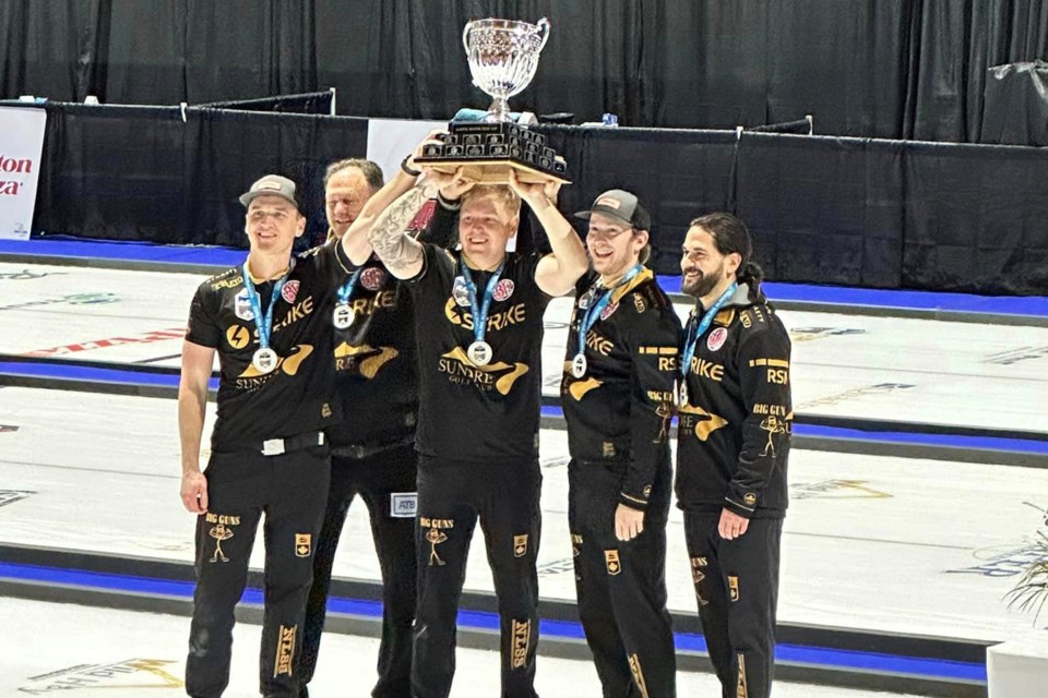 The Aaron Sluchinski team with the provincials final cup.
