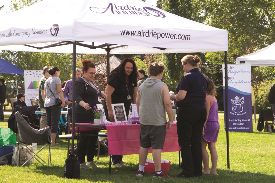 A number of local organizations gathered at Nose Creek Regional Park on Aug. 31 for an event recognizing International Overdose Awareness Day. Photo by Jordan Stricker/Airdrie City View