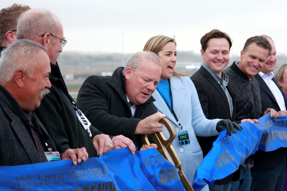 The 40th Avenue interchange to the QEII was officially marked completed with a private ribbon cutting ceremony on Oct. 12 ahead of the road opening the following day.