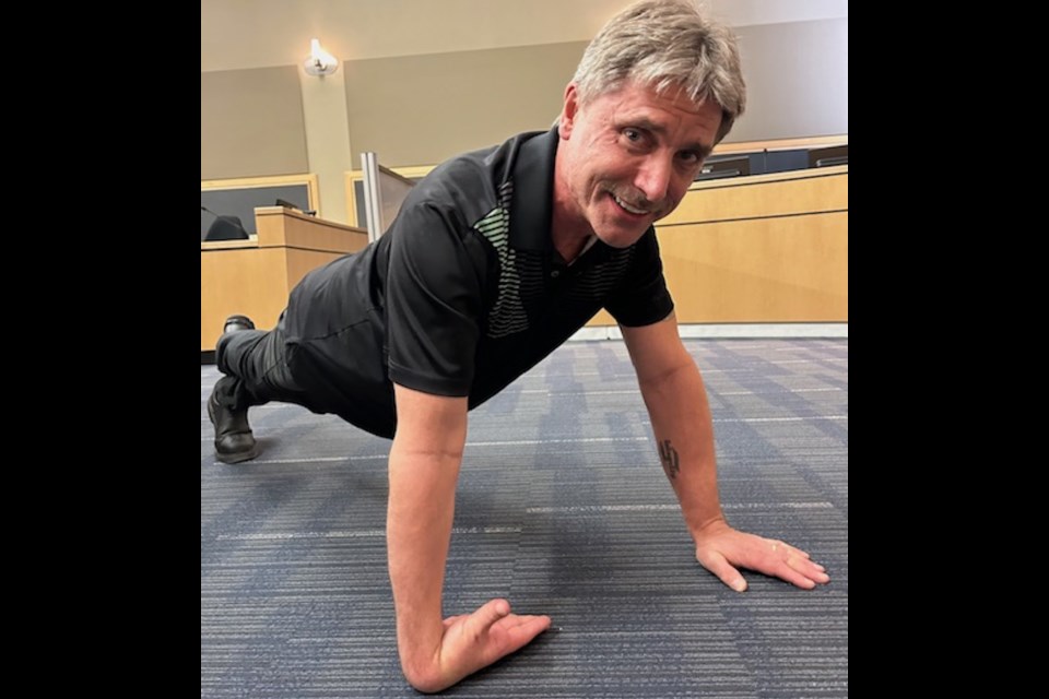 Airdrie City Councillor Darrell Belyk aims for 4,000 push ups in February to raise awareness for mental health in Canada.
