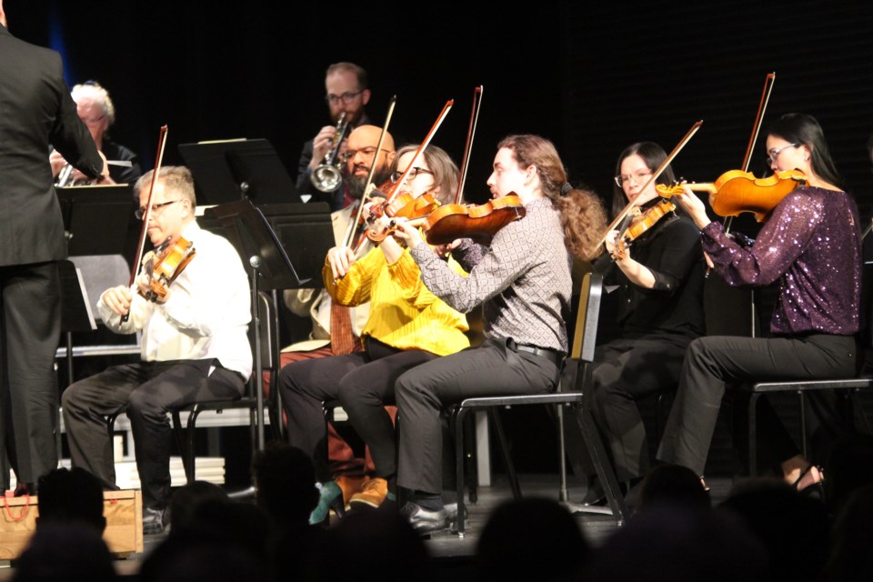 Both guests and musicians had a stimulating evening listening to and playing Mozart's works at the Rocky Mountain Symphony Orchestra's celebration of the great composer's birthday at the Polaris Centre on Jan. 28.