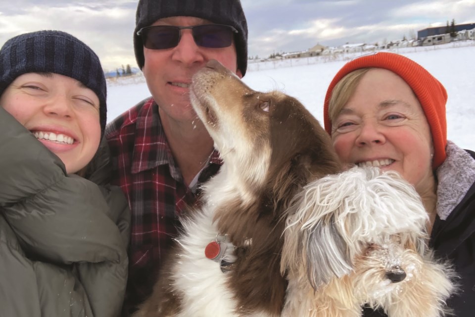 Rocky View County Division 2 Councillor Kim McKylor is pictured with her family and pups enjoying the Springbank Dog Park. 