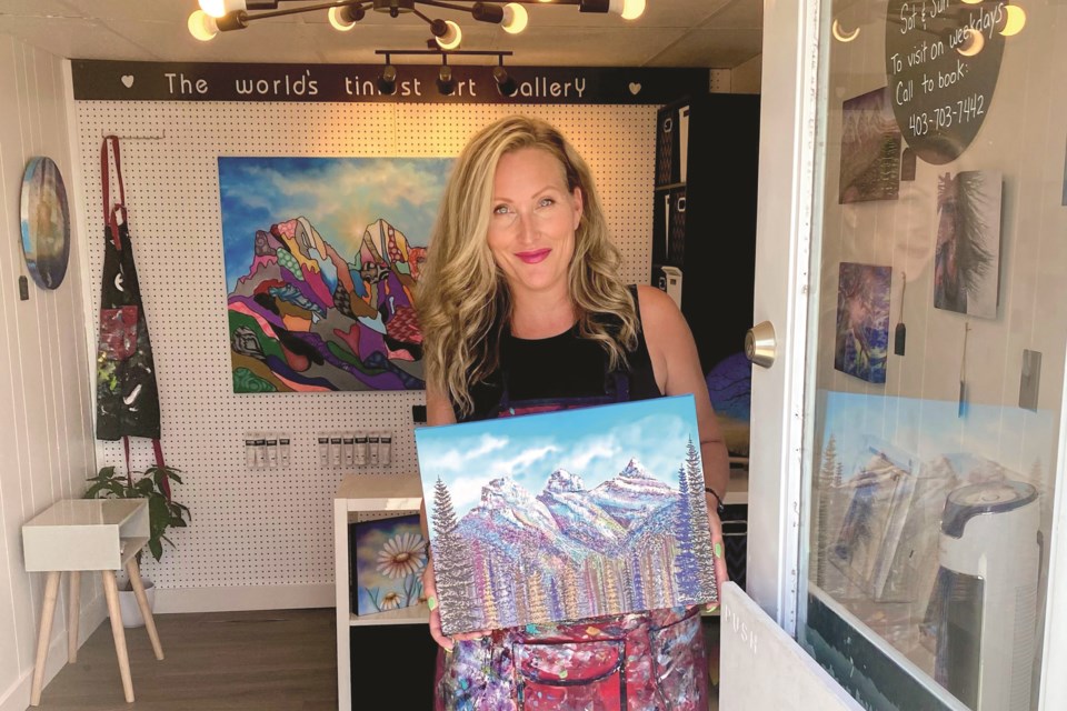 Erin Conn, owner and founder of The World's Tiniest Art Gallery, celebrated a grand opening on Aug. 13 welcoming friends and family to her tiny art space. 